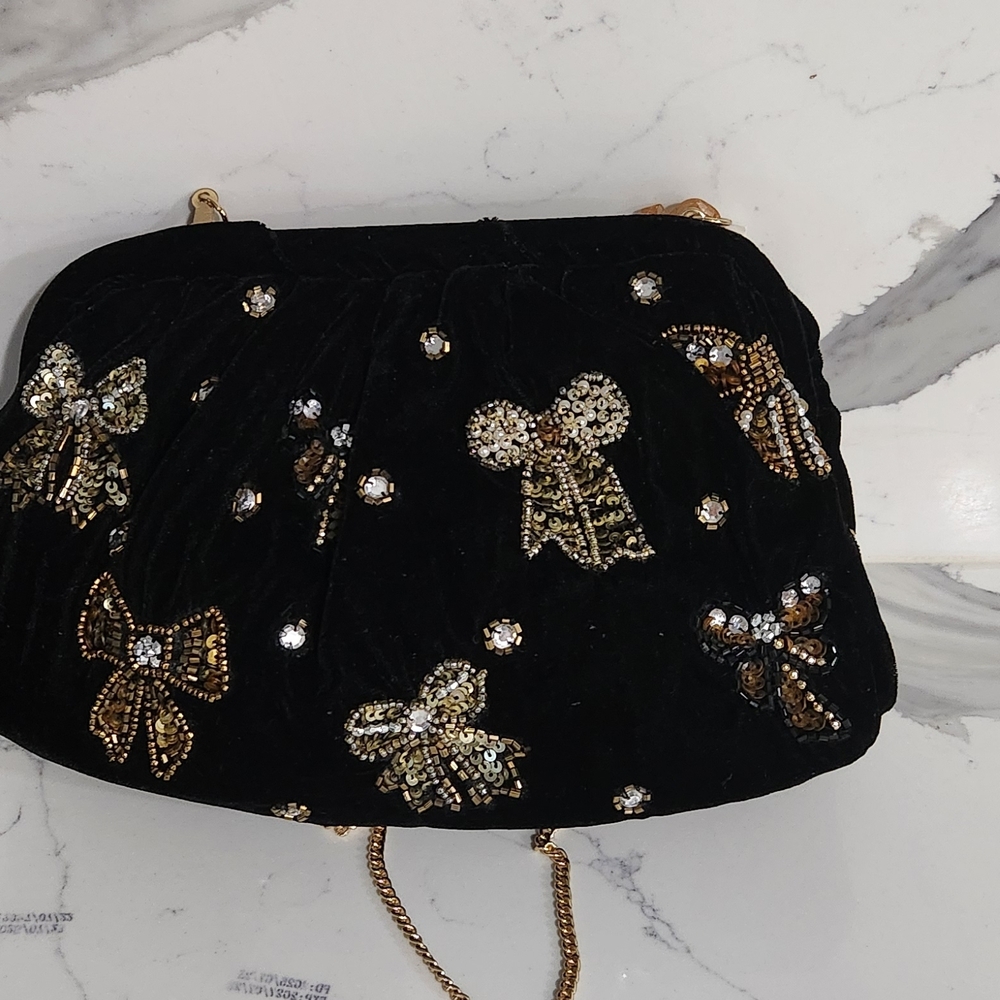 Elegant Black Velvet Clutch with Gold Embellishments